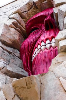 Osaka, Japan - Feb 6 2015 : Life size scale Statue of Wall giant from Attack on Titan (Shingeki no Kyojin) at Universal Studios Japan.