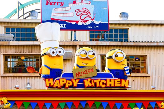 OSAKA, JAPAN - Nov 13, 2019 : Close up HAPPY MINION statue in Universal Studios Japan. Minions are famous character from Despicable Me animation.