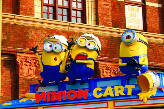 OSAKA, JAPAN - Nov 13, 2019 : Close up HAPPY MINION statue in Universal Studios Japan. Minions are famous character from Despicable Me animation.