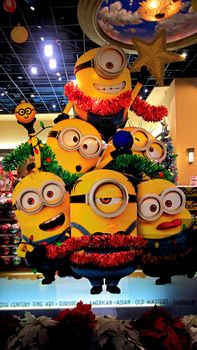 OSAKA, JAPAN - Nov 13, 2019 : Close up of Christmas Happy holiday version of HAPPY MINION statue in Universal Studios Japan. Minions are famous character from Despicable Me animation.