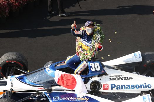 \{persons}\wins the Indianapolis 500 at the Indianapolis Motor Speedway in Indianapolis, Indiana.