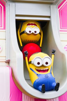 OSAKA, JAPAN - Feb 29, 2020 : Close up of HAPPY MINION statue, located in Universal Studios Japan. Minions are famous character from Despicable Me animation.