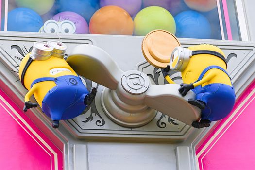 OSAKA, JAPAN - Feb 29, 2020 : Close up of HAPPY MINION statue, located in Universal Studios Japan. Minions are famous character from Despicable Me animation.