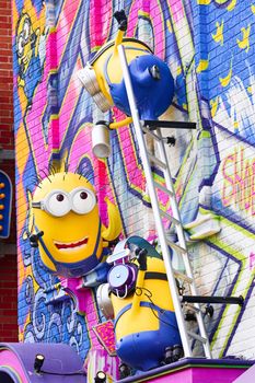 OSAKA, JAPAN - Feb 29, 2020 : Close up of HAPPY MINION statue, located in Universal Studios Japan. Minions are famous character from Despicable Me animation.