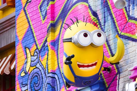 OSAKA, JAPAN - Feb 29, 2020 : Close up of HAPPY MINION statue, located in Universal Studios Japan. Minions are famous character from Despicable Me animation.