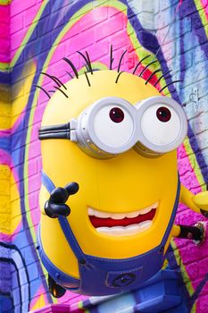 OSAKA, JAPAN - Feb 29, 2020 : Close up of HAPPY MINION statue, located in Universal Studios Japan. Minions are famous character from Despicable Me animation.