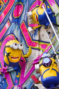 OSAKA, JAPAN - Feb 29, 2020 : Close up of HAPPY MINION statue, located in Universal Studios Japan. Minions are famous character from Despicable Me animation.