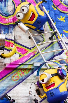 OSAKA, JAPAN - Feb 29, 2020 : Close up of HAPPY MINION statue, located in Universal Studios Japan. Minions are famous character from Despicable Me animation.