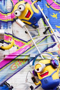 OSAKA, JAPAN - Feb 29, 2020 : Close up of HAPPY MINION statue, located in Universal Studios Japan. Minions are famous character from Despicable Me animation.