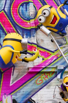 OSAKA, JAPAN - Feb 29, 2020 : Close up of HAPPY MINION statue, located in Universal Studios Japan. Minions are famous character from Despicable Me animation.