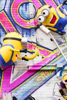 OSAKA, JAPAN - Feb 29, 2020 : Close up of HAPPY MINION statue, located in Universal Studios Japan. Minions are famous character from Despicable Me animation.