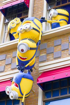 SAKA, JAPAN - June 24, 2017 : Statue of "HAPPY MINION", located in Universal Studios Japan, Osaka, Japan. Minions are famous character from Despicable Me animation.