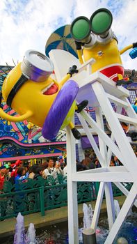 OSAKA, JAPAN - November 03, 2017 : Statue of MINIONS at MINION PARK ENTRANCE in Universal Studios JAPAN.  Minions are famous characters from Despicable Me animation.