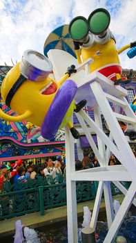 OSAKA, JAPAN - November 03, 2017 : Statue of MINIONS at MINION PARK ENTRANCE in Universal Studios JAPAN.  Minions are famous characters from Despicable Me animation.