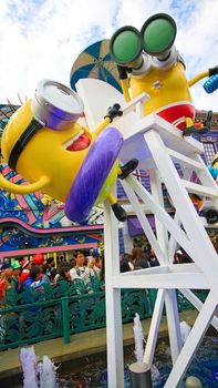 OSAKA, JAPAN - November 03, 2017 : Statue of MINIONS at MINION PARK ENTRANCE in Universal Studios JAPAN.  Minions are famous characters from Despicable Me animation.