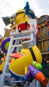 OSAKA, JAPAN - November 03, 2017 : Statue of MINIONS at MINION PARK ENTRANCE in Universal Studios JAPAN.  Minions are famous characters from Despicable Me animation.