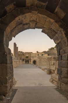 Sunset view of The Roman theater entrance gate, in the ancient Roman-Byzantine city of Bet Shean (Nysa-Scythopolis), now a National Park. Northern Israel