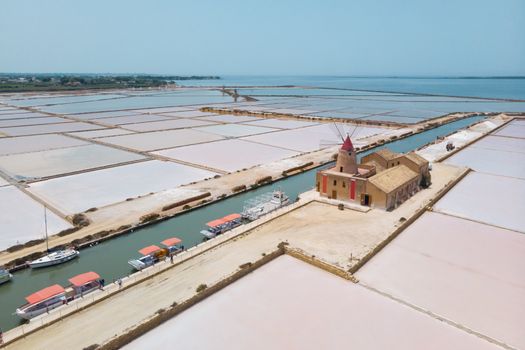 Windmill of Infarsa Salina near Marsala, Trapani, Italy.