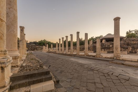 Sunset view of the reconstructed cardo (Palladius Street), in the ancient Roman-Byzantine city of Bet Shean (Nysa-Scythopolis), now a National Park. Northern Israel
