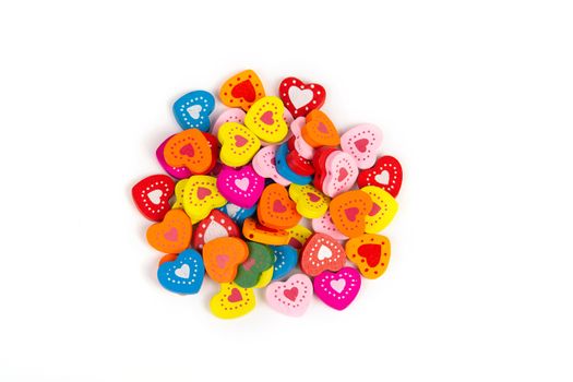 Sewing Colorful wooden buttons beads on white background. Use for handmade and children's creativity. Space for text.