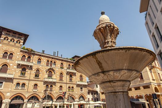 Fountain in Treviso city center in a sunny summer day