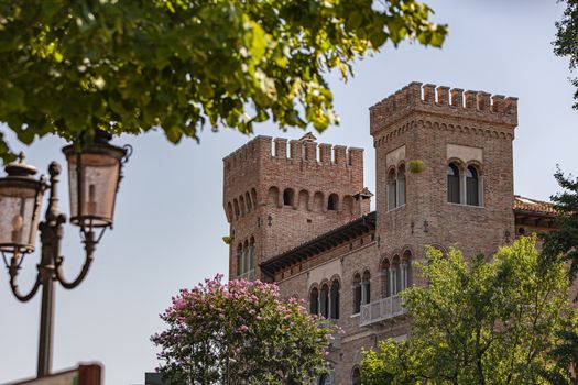 Castle of the city of Treviso in Italy filtered by the trees that surround it