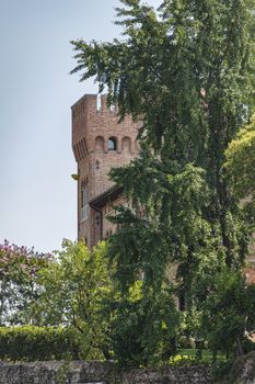 Castle of the city of Treviso in Italy filtered by the trees that surround it