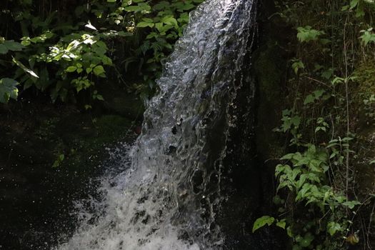 natural landscape with waterfalls in Trentino in northern Italy