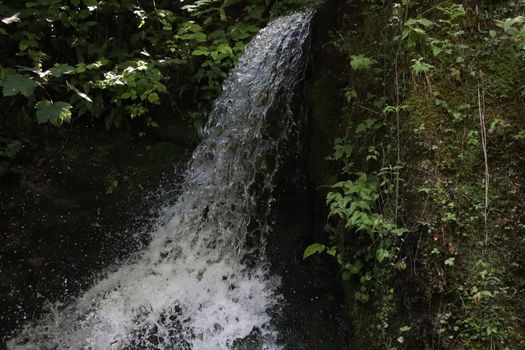 natural landscape with waterfalls in Trentino in northern Italy