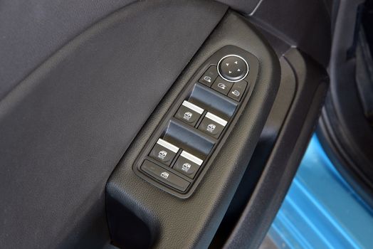 Side mirror switch control, car interior detail