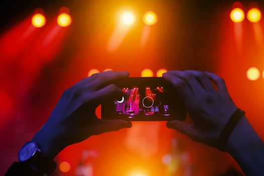Live stream for social networks at a concert. Using a smartphone camera