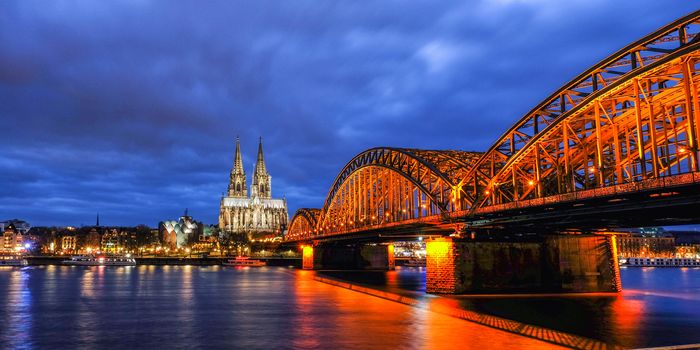 Cologne Cathedral and Hohenzollern Bridge at Twilight Time in Germany