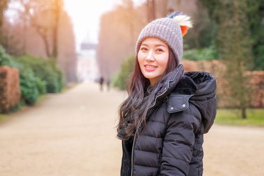 Young female tourist in Sans Souci palace in Potsdam, Berlin, Germany, Europe.