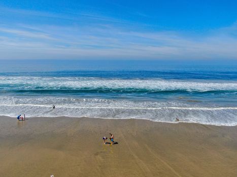 Aerial view of Huntington Beach and coastline during hot blue sunny summer day, Southeast of Los Angeles. California. destination for holiday and surfer