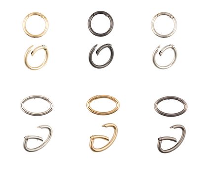 gold, silver and black chrome set of metal carabiner chain, isolated, white background. Key ring with clipping path. front and side view. use for bags and belts