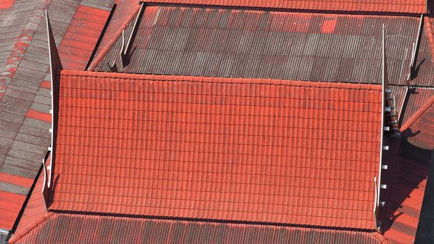 Roof tiles and made from ceramic and metal material and top view angle.