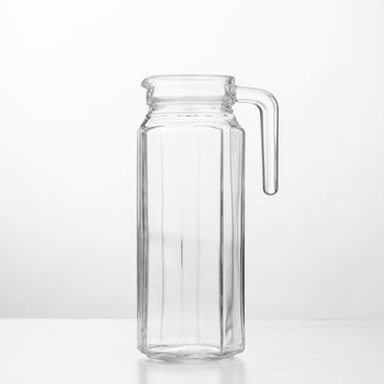 empty glass jug, white background