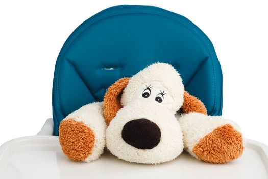 dog toy on high chair for baby