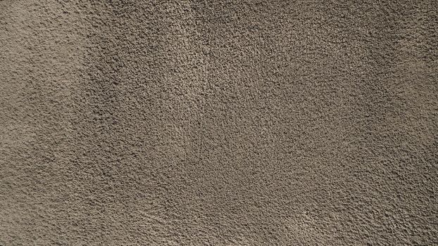 Concrete cement background and dirty rugged and jagged rough texture.