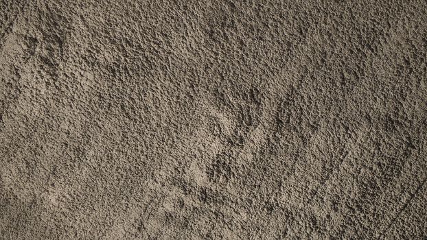 Concrete cement background and dirty rugged and jagged rough texture.