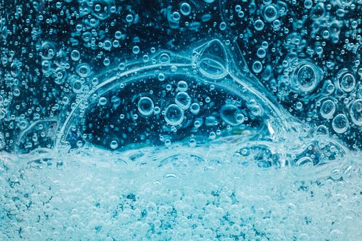abstract liquid soap bubbles blue background