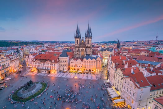 Old Town square with Tyn Church in Prague, Czech Republic at sunset