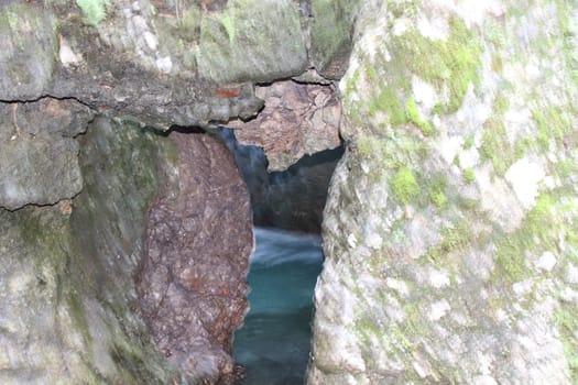 natural view with underground river between the rocks