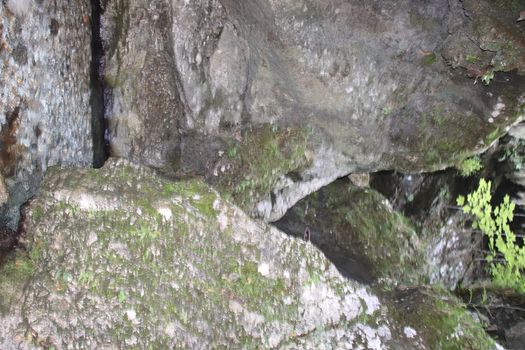 natural view with underground river between the rocks