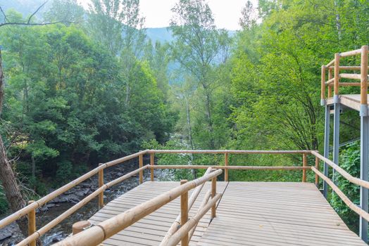 Bridge the Valira del Orient river in Cami Ral in summer in Andorra.