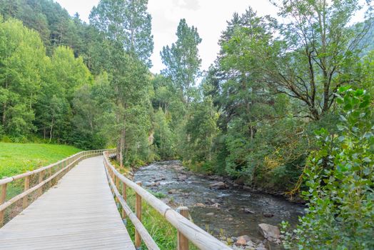 Bridge the Valira del Orient river in Cami Ral in summer in Andorra.