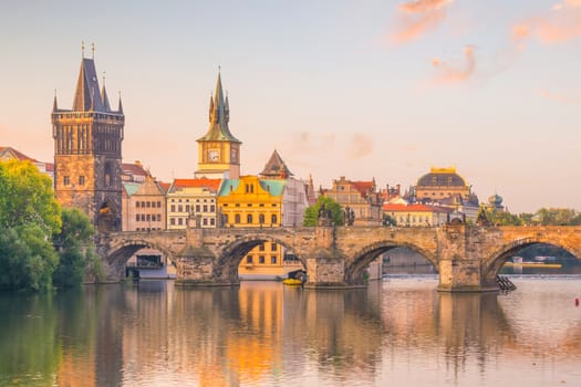 Famous iconic image of Charles bridge and Prague city skyline in Czech Republic