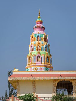 Colorful dome of village side Indian temple near Saswad,Maharashtra,India.