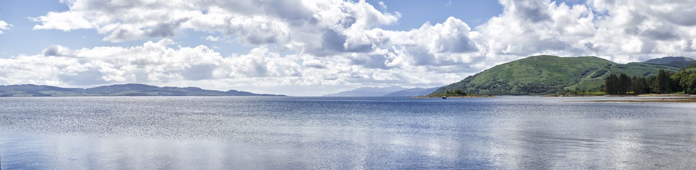 Panoramic view from waters edge of Loch Glip on the West Coast of Scotland