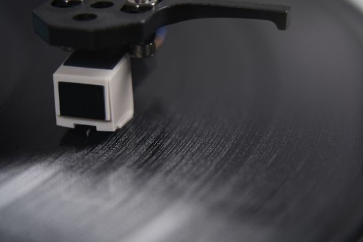 Close Up Of  Record Player Turntable Showing Needle On Vinyl LP